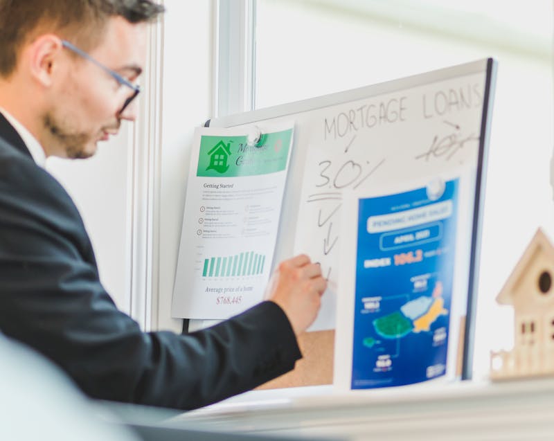 a an writing about home loans on a white board